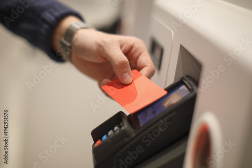 Wallpaper Mural Customer inserting payment card into terminal for transaction. Banking, finance and electronic payment concept. Torontodigital.ca