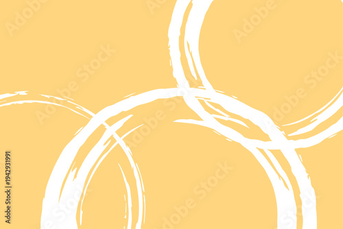 オレンジの背景に白いラフなブラシ円が描かれた背景