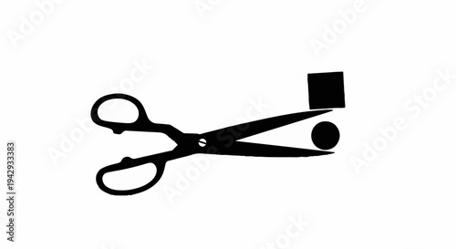 Scissors cutting a circle from a square, symbolizing precision and modification.