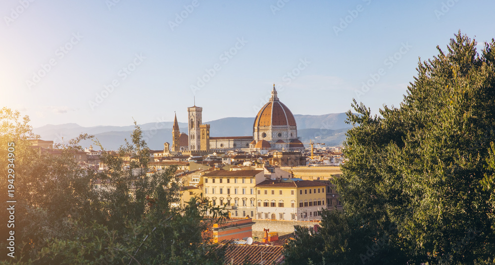 Fototapeta premium Florence cityscape with Brunelleschi's Dome and Giotto's Bell Tower, historic architecture against a clear sky