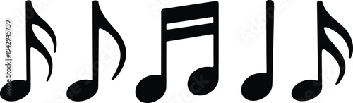 Fotografija Black silhouettes of various musical notes on a white background Keywords: music