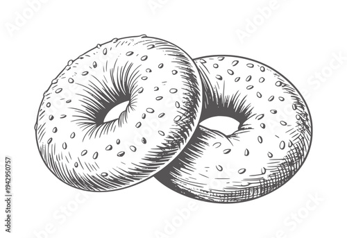 Black and white of two round bagels with sesame seeds food