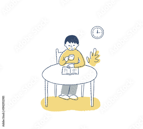 コーヒーを飲みながら本を読んでいる女性