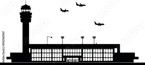 Airport terminal building with control tower and planes flying overhead silhouette