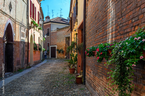 Cozy narrow street in Ferrara, Emilia-Romagna, Italy. Ferrara is capital of the Province of Ferrara