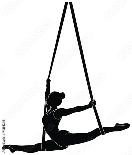 A female aerialist performing a split on an aerial silk harness, a high-contrast silhouette, and fitness acrobatics.