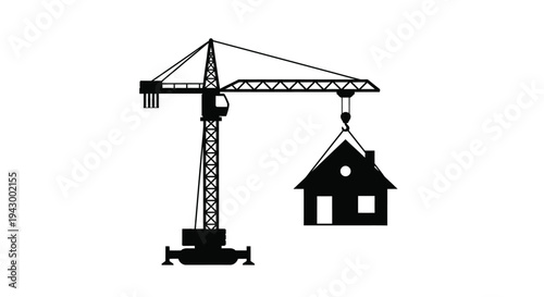 Construction crane lifting a house a striking black silhouette