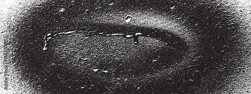 Distressed black grunge texture with subtle water droplets and granular effect