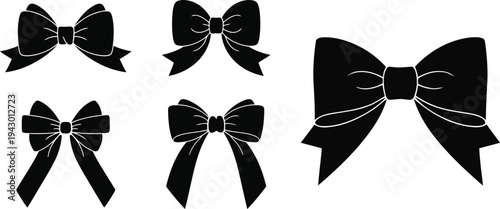 Collection of five black bows on white background