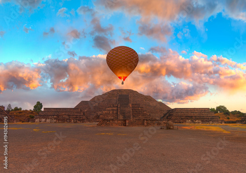Hot air balloon flying over Teotihuacan pyramids complex located in Mexican Highlands and Mexico Valley close to Mexico City. Mexico