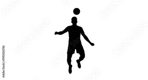 Man Jumping and Kicking Soccer Ball.