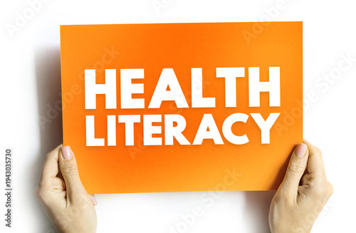 Wallpaper Mural HEALTH LITERACY phrase on card held by hands, concept of medical understanding, wellness education, and public knowledge Torontodigital.ca