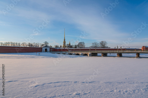 Ioanovsky Bridge across the Kronversky Bayou and the Peter and Paul Fortress on a frosty winter morning, St. Petersburg, Russia