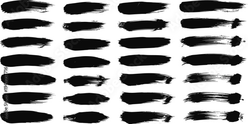 Collection of black brush strokes on a white background for artistic and design purposes