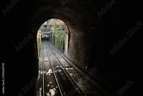 Funicular railway ride to upper town of Bergamo with scenic city view in Lombardy Italy. Popular tourist attraction.
