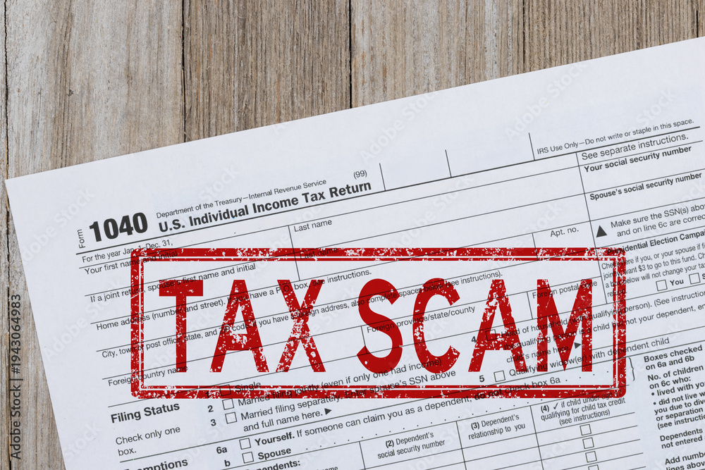 Fototapeta premium Tax scam warning on US 1040 tax form