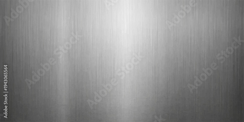 A sleek brushed metal texture features a shiny silver stainless steel plate pattern with a smooth metallic surface reflection on a gray aluminum material backdrop