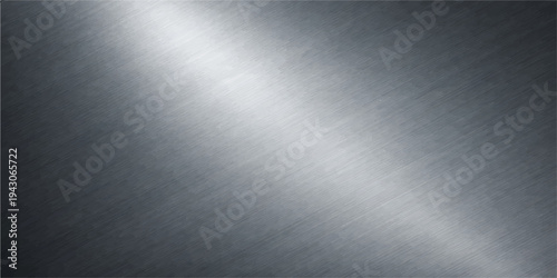 A polished stainless steel plate features a brushed metal texture with a shiny silver surface and light grey chrome reflections on a seamless metallic aluminum backdrop material pattern