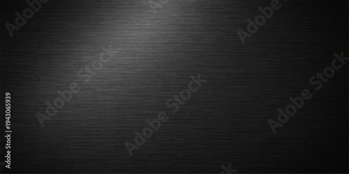 A dark brushed metal texture background features a black metallic steel pattern with a grey silver aluminum surface and grunge material design for a textured iron backdrop