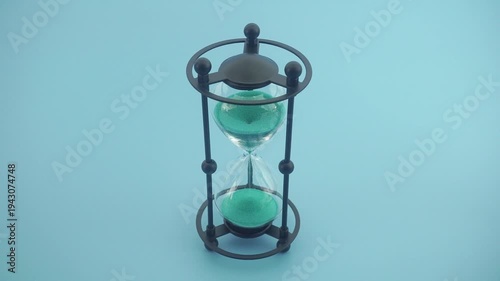 An Elegant Home Accessory In The Shape Of An Hourglass Made Of Metal And Gla