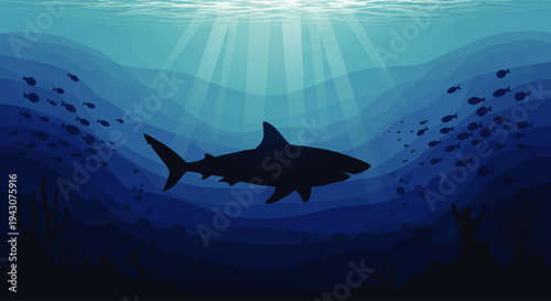 Underwater Scene with Silhouette of a Shark Swimming with a School of Fish in a Sunlit Ocean