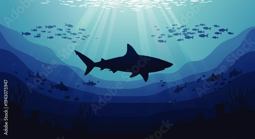 Powerful shark silhouette gracefully navigates the deep blue ocean, surrounded by schools of fish, with light rays illuminating the serene underwater environment