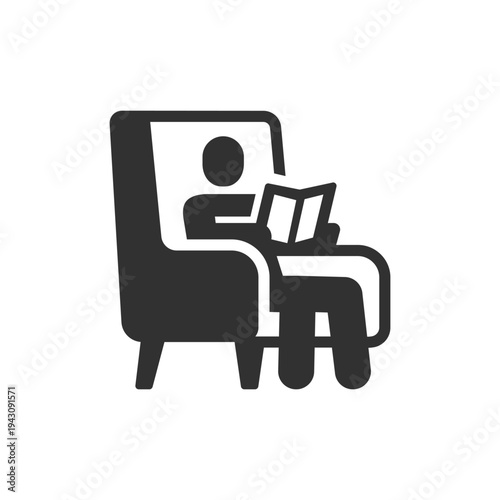 Person reading book in armchair icon. Leisure reading and relaxation concept. Monochrome black and white symbol