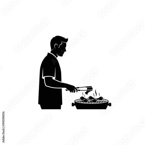 Man grilling chicken wings on barbecue silhouette on white background