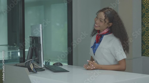 Airport Check-in Counter. Verifying Passenger During Passport Check in International Airport Terminal. air hostess checks passport and boarding pass at airport. customer service before flight.