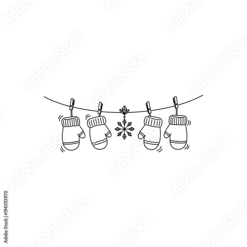Four mittens hanging on a clothesline with snowflake.