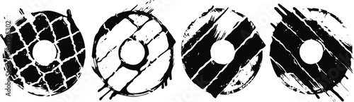 set of four black and white abstract donut or bagel silhouettes with textured grunge