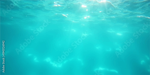 Clear blue underwater ocean surface with bubbles waves and light rays creating abstract water texture pattern