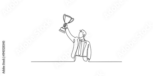 Businessman holding up a trophy in celebration of achievement success award victory winner championship accomplishment