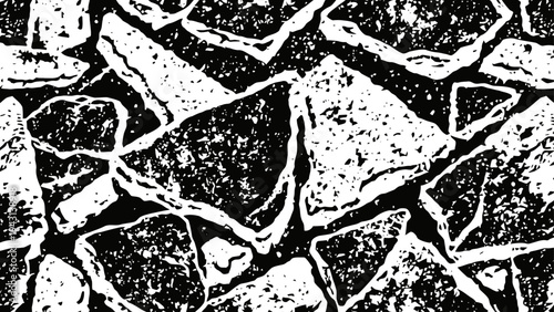 Abstract black and white mosaic texture with irregular triangular shapes and stone pattern design