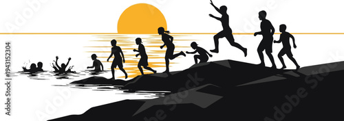 Silhouettes of children playing in water and running along rocky shore at sunset