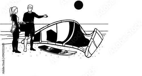 Two people in wetsuits by a kiteboard on a sandy beach, with a kite