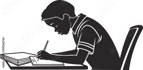  An African boy immersed in study, diligently writes in his notebook while sitting at desk.