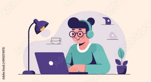 Person with headphones and glasses working on laptop at desk with lamp and plant