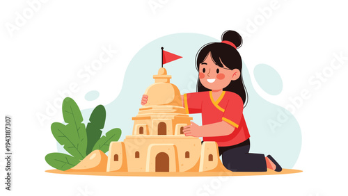 Happy young girl kneeling and meticulously building a traditional sand pagoda on the beach, celebrating a cultural festival.