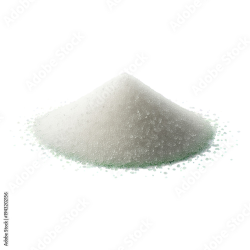 Pile of white sugar crystals with green tint spilled on a white background