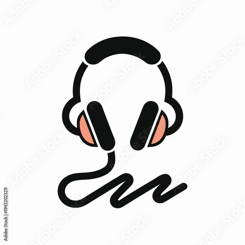 Black headphone with pink ear cushions and a curly cord headphones