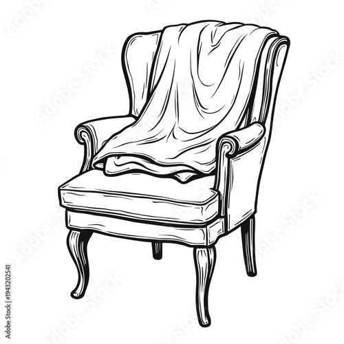 Armchair with soft blanket draped over it in minimalist style  