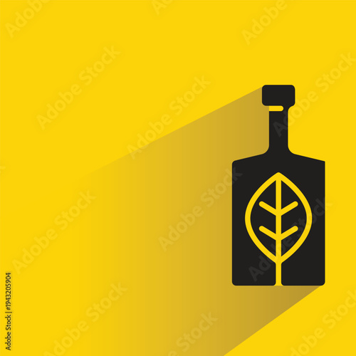 bottle and leaf icon with shadow on yellow background