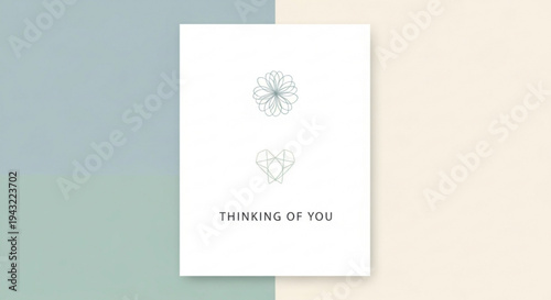 Greeting card with 'thinking of you' message and heart flower designs on colorful background