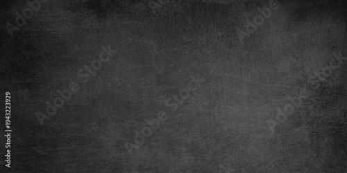 A dark grunge black leather texture background with an old vintage grey pattern provides a blank textured material backdrop for a dirty canvas design