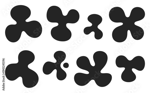 Collection of abstract black amoeba-like shapes on a white background