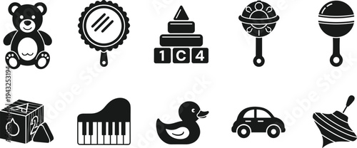 Selection of baby toys including a teddy bear, piano, and car mirror stacking toy