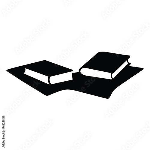 Two scholarly books lying on a slightly wrinkled cloth in black and white