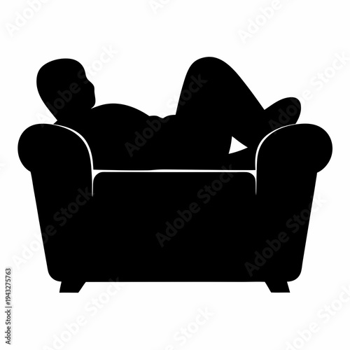 Black Silhouette of a Person Reclining Comfortably on an Armchair