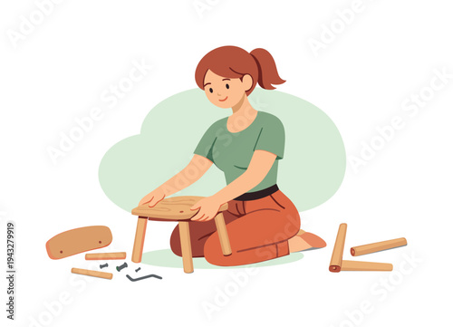 Woman assembling a small wooden stool with tools and parts laid out around her